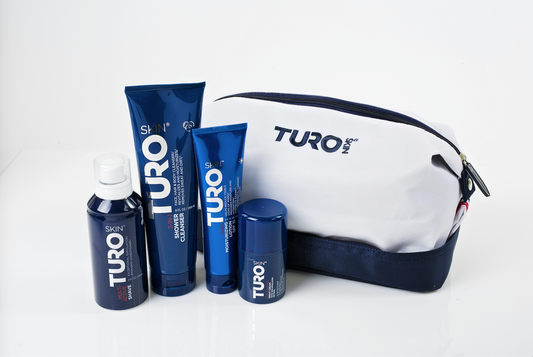 TuroSkin Essentials Kit with complete skincare set in a white sailcloth dopp bag.