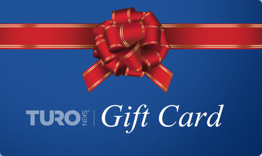 A graphic image of a TuroSkin gift card with a red ribbon and bow on a blue background.